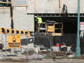 Mounting something to the building.