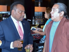 City Treasurer Spencer Coggs, and Juan Carlos