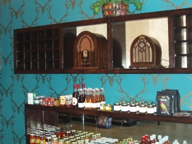 A small grocery selection is combined with classic radios that have been restored for sale by one of Bell's friends.