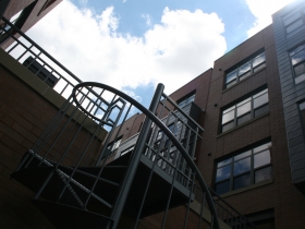 Staircase to courtyard at Gaslight Lofts.