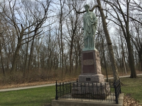 Statue of Labor which is also known as “The Pewter Lady” by sculptor Gustav Haug.