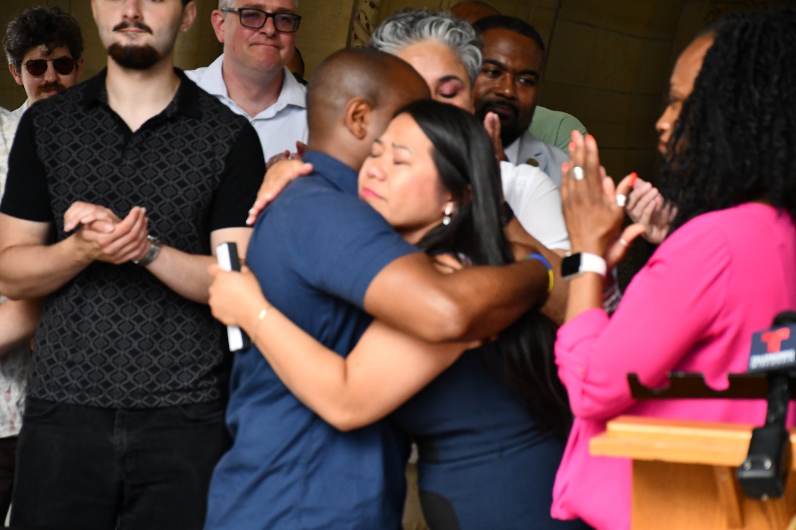 Mayor Cavalier Johnson Hugs Diana Vang-Brostff After Signing Housing Legislation