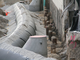 Temporary Sewer and Old Piles at The Couture