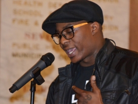 Milwaukee poets share their work in the city hall rotunda.