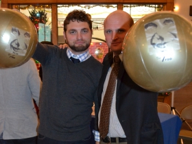 Alderman Kovac and Newaukee president Ian Abston display the Bronze Fonze beach balls used during Adam Carr’s 100 Bronze Fonz Boulevard proposal.