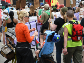 Woman and Child at Coalition to March on the RNC