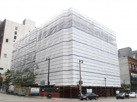 Plastic Wrapped Iron Block Building