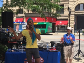 Lex Allen performs with DJ Shawna at the ribbon cutting ceremony