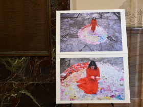 Eva Petric with Roses of Hope before stylizing them into Bird of Hope for Peace. Original photos taken at Mauthausen concentration camp on the Slovenian-Austrian border. Photo by Lauren Hafeman on Oct. 8, 2026.