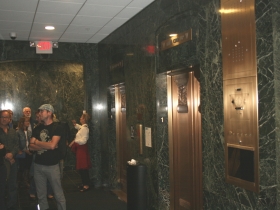 Waiting for the elevator.