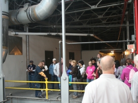 The tour group gathers on the 9th floor of City Hall.