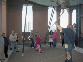 Ringing the bell.