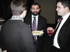 Democratic Party of Milwaukee County Chairman Sachin Chheda samples some appetizers.