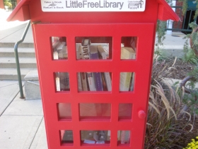 Little Free Library in front of City Hall Square Apartments.