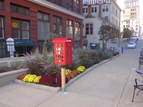 Little Free Library in front of City Hall Square Apartments.