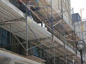 The scaffolding is still up at that Iron Block Building.