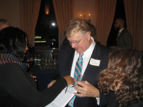 Gary Goyke signs Rebecca Dallet’s nomination papers.