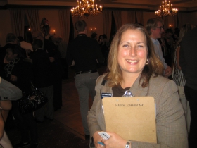 Laura Gramling Perez has her nomination papers in a clipboard from Nation Consulting