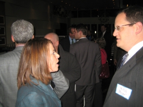 Judge Rebecca Dallet chats with Mitch Moser at her Unami Moto fundraiser.