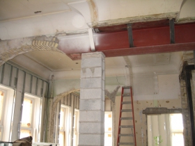 21st century I-beams and concrete blocks support the structure above