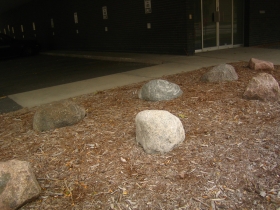 A pile of rocks in a brick bed at 795 N. Van Buren St.