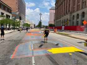 Repainting the Defund the Police mural