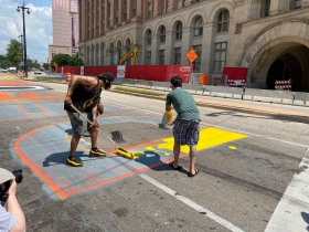Repainting the Defund the Police mural