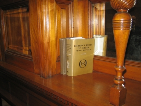 Robert's Rules of Order is a secular Bible for the administration of democratic procedure. Former President Hines left a copy behind for his successor.