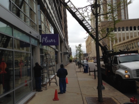 The sign going up at Plum