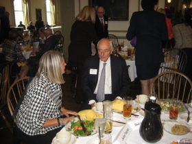 GMC CEO and House Confidential honoree Julia Taylor chats with Sheldon Lubar at the group's monthly meeting. Photo by Michael Horne.