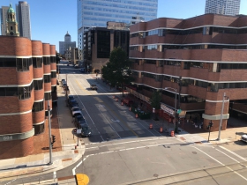 E. Wells St.