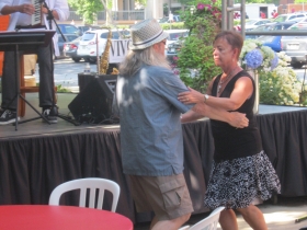 Dancing to the music.