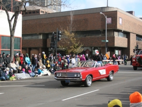 County Executive Chris Abele rides in a classic convertible.