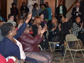 The Congresswoman shows her support for the young poet on stage
