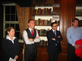 Julie Lassa [l], Chris Larson [middle l], and Tim Carpenter [r] listening to the speaker.