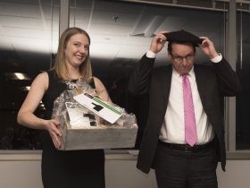 Emily McElwee, assistant director of East Town Association and John Utz, Milwaukee market president and head of corporate banking of Associated Bank