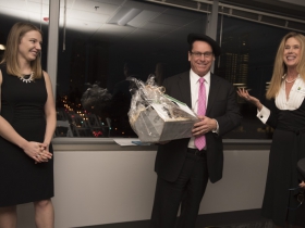 Emily McElwee, assistant director of East Town Association, John Utz, Milwaukee market president and head of corporate banking of Associated Bank, and Kim Morris, executive director of East Town Association