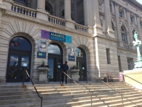 The outside of the Milwaukee Central Library on Wisconsin Ave is currently hosting a Maurice Sendak showcase.