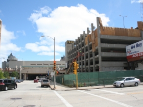 Demolition of the parking structure at W. Wells and N. 6th streets.