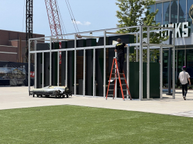 RNC Covering Bucks Monument Sign in Front of Fiserv Forum