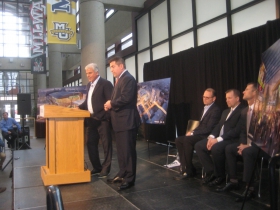 Michael Fascitelli and Peter Feigin at the podium.