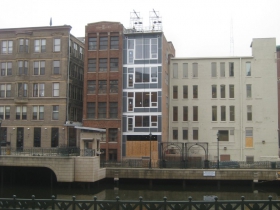 Living units in old riverfront commercial building.