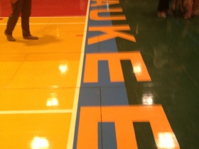 Milwaukee painted on the basketball court.