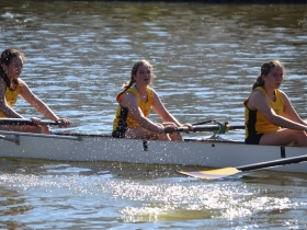 The Ignatius Chicago Crew Junior Women Cross the Finish Line