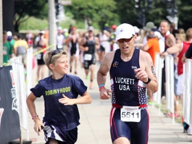 Son joins his dad to finish the race.