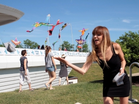 Melissa Aldape, from San Francisco, CA enjoyed a game of  toss  the bean bag with her husband Juan