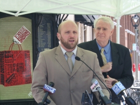 Ald. Nik Kovac speaking at the ZipCar event.