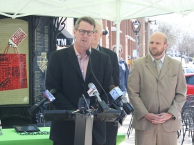 Jim Plaisted speaking at the ZipCar press conference.
