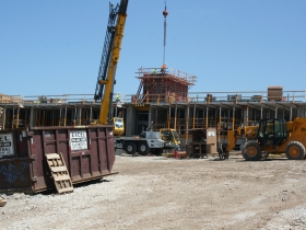 Workers Assembling a Tower