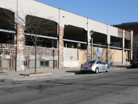 Construction at the former Prospect Mall as the auto dealership turned mall is being converted to a mixed-use apartment building.